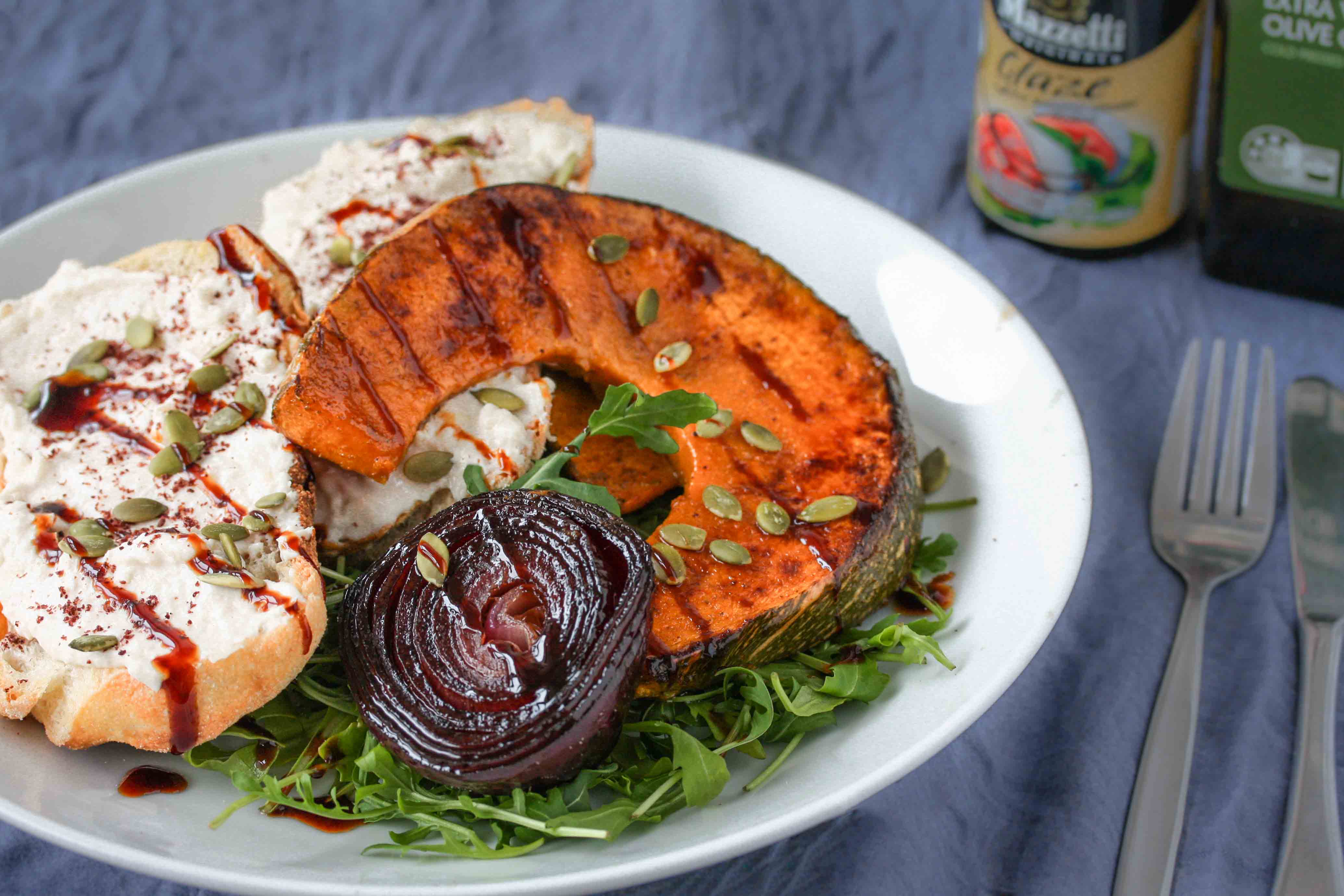 Roast pumpkin and red onion with white bean and feta toast