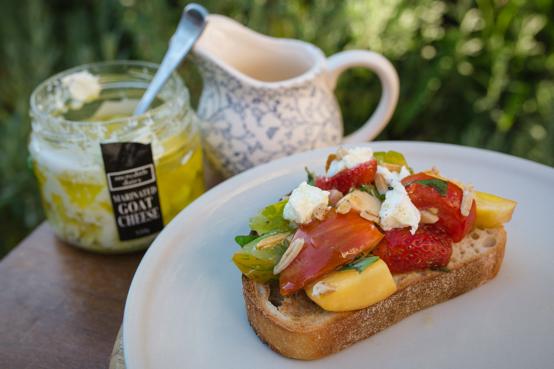 Heirloom tomato, nectarine and strawberry bruschetta with basil and feta